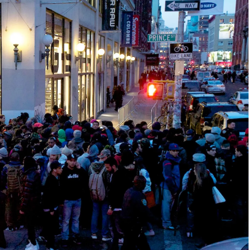 Crowd of New Yorkers waiting in line for Fall 2025 sneaker drops, including Jordans, Dunks, and Foamposites V4NY
